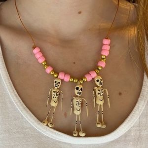 Pink and gold bead skeleton necklace